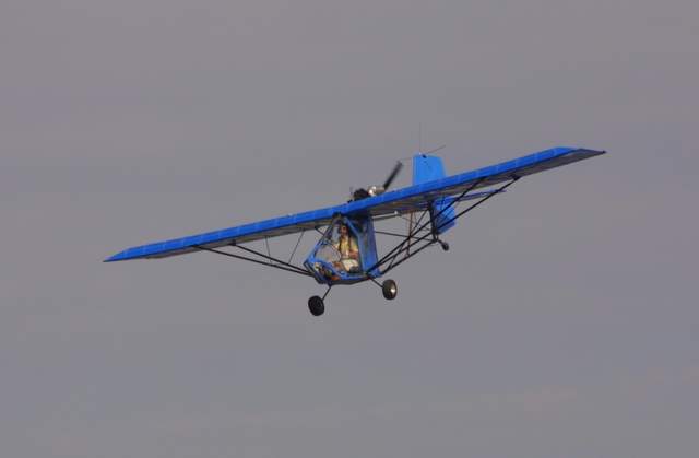 T Bird Single Seat light sport aircraft coming in for a landing at Airventure.